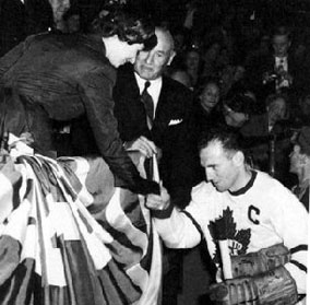 Teeder pays homage to Princess Elizabeth while Conn Smythe looks on, 1951