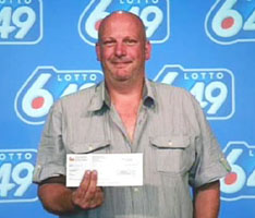 Barry Shell Barry Shell of Brampton, Ontario picks up his winning cheque at the Ontario Lottery and Gaming headquarters in Toronto, Monday, July 20, 2009. OLG authorities had already discovered he was wanted by police for theft. Immediately after posing with his $4,377,298 cheque, he was arrested by police.