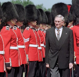 The late Romeo LeBlanc, Governor General of Canada, 1995—1999, referred to himself in office as a “head of state” in 1999. Here he performs his annual inspection of the ceremonial guard at Rideau Hall on June 22, 1999.