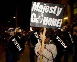 Protesters clash with riot police as they await the arrival of Prince Charles and Camilla, Duchess of Cornwall in Montreal, Tuesday, Nov., 10, 2009. THE CANADIAN PRESS/Graham Hughes.