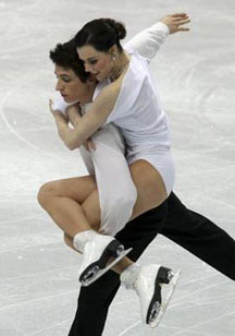 Tessa Virtue and Scott Moir of Canada (southwestern Ontario branch) perform at Vancouver, Monday, February 22, 2010. They finally became both the first Canadians – and the first  North Americans – to win the Olympic ice dance gold medal. Photograph by: John Mahoney / Canwest News Service.