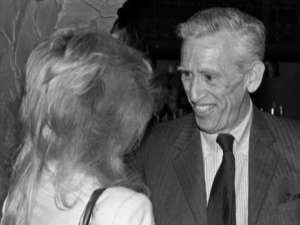 J.D. Salinger, 63, with actress Elaine Joyce at the Alhambra Dinner Theater in Jacksonville, Florida, 1982. This was their first in-person meeting after a “romance via telephone and mail.” Ms. Joyce discovered: “He wasn’t a very nice man.” GENE SWEENEY JR./The Times-Union. 