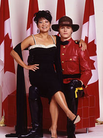 New Democrat MP Olivia Chow, standing on guard for Canada with a famous Mountie.