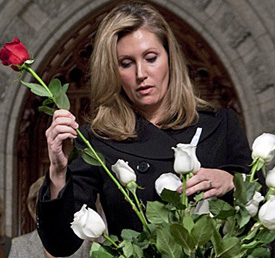 Helena Guergis, minister for status of women, honours the 14 women slain in Montreal in 1989 at a ceremony in the Canadian House of Commons foyer, December 1, 2009. ADRIAN WYLD/THE CANADIAN PRESS.