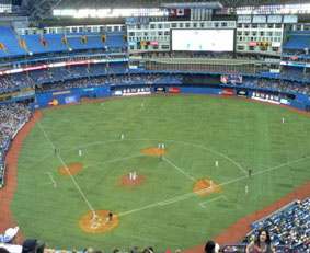 The Rogers Centre in downtown Toronto, formerly the Sky Dome – “first stadium with a retractable roof allowing any sport to be played indoors or outdoors, rain or shine.” Or snow, etc, of course: but it probably won’t be needed at all on the evening of Monday, April 12, 2010.