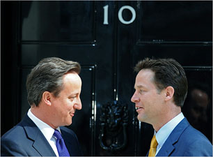 Prime Minister David Cameron (l) and Deputy Prime Minister Nick Clegg, outside 10 Downing Street on Wednesday 12 May 2010. Carl De Souza/Agence France-Presse – Getty Images.