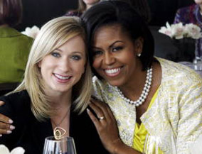 Michelle Obama and Canadian figure skater Joannie Rochette, at a "Women of Distinction" luncheon during the G20 Toronto Summit. Mike Cassese/REUTERS.