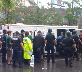 Police detaining protesters and god knows who else on Sunday evening, Queen and Spadina. 