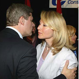 Belinda Stronach, shown here with Stephen Harper at a June 2004 rally in Aurora, Ontario, would probably be comfortable enough with a Liberal-Conservative coalition in 2010. Many other current supporters would not – especially if it was led by Stephen Harper. CP Photo/Frank Gunn.