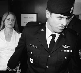 Captain Robert Semrau leaves a court martial in Gatineau, Quebec with his wife, Amelie, on Monday, July 19, 2010. Photograph by Wayne Cuddington, Postmedia News.