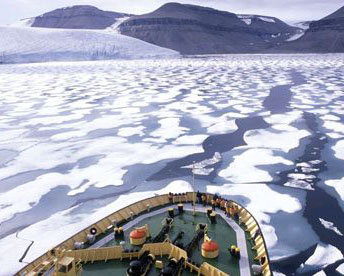 Ice breaker makes its way through Northwest Passage. The ice packs are breaking up in season with global warming.