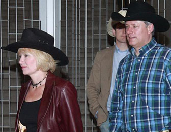 Prime Minister Stephen Harper and his wife Laureen enter Calgary Stampede President's Breakfast on Friday, July 9, 2010. Photo: Ted Rhodes, Calgary Herald.