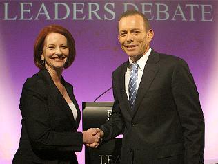  “Julia Gillard and Tony Abbott share a moment before hostilities begin / Picture: Ray Strange.”